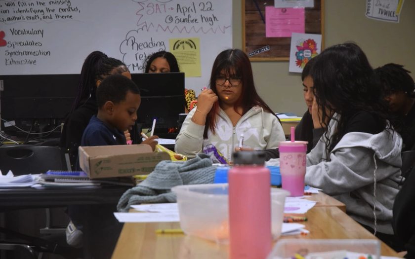 Students working with a teacher at Sunfire